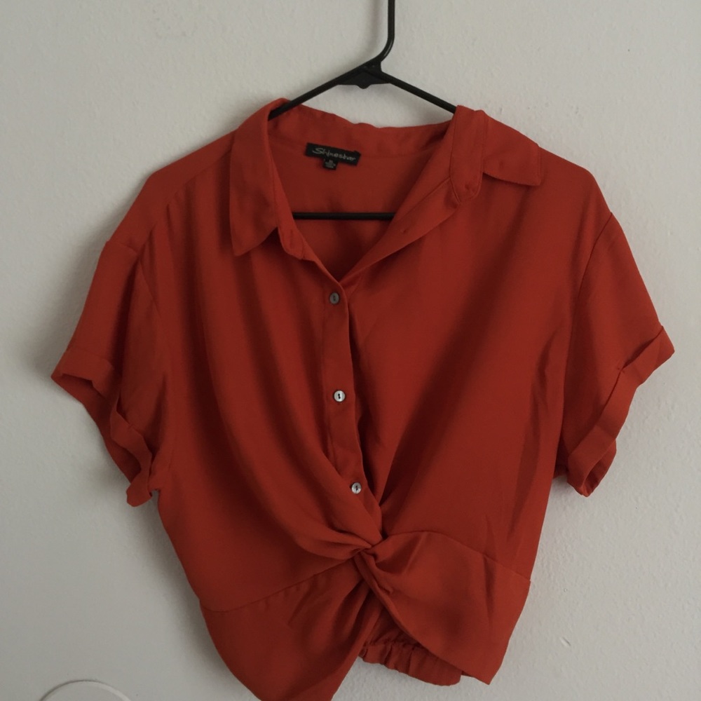 Women’s orange blouse